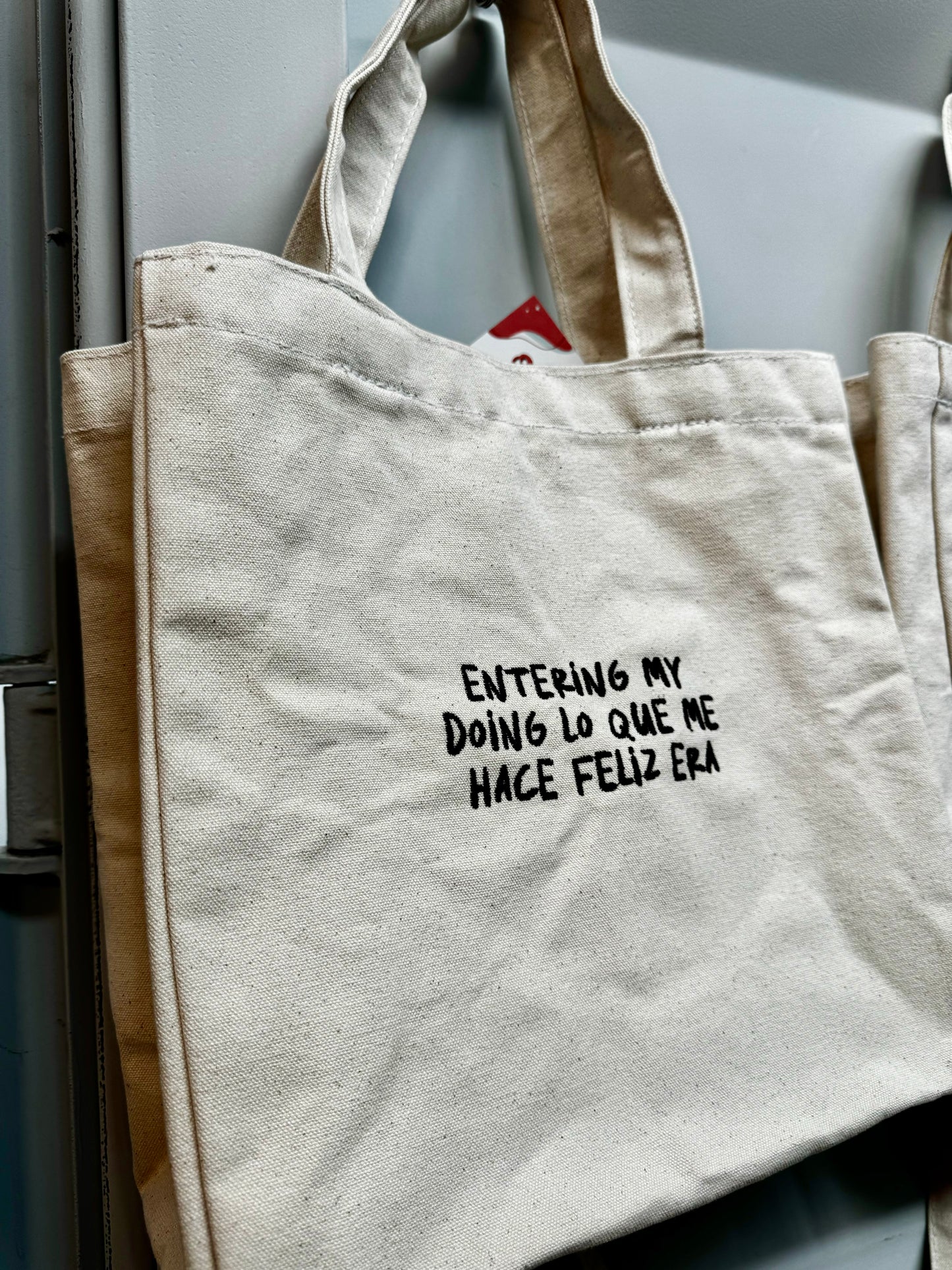feliz era tote bag