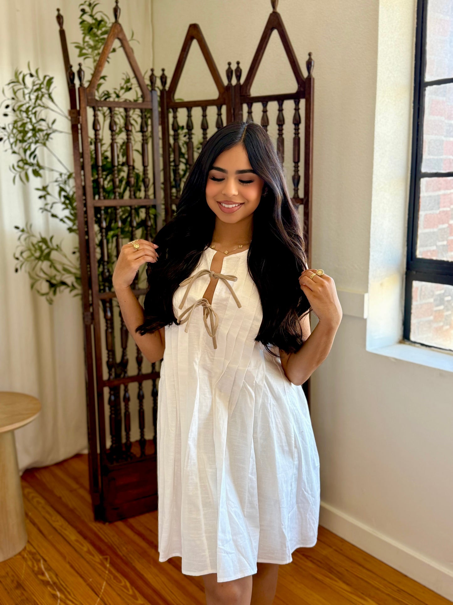 Day taking pleated dress