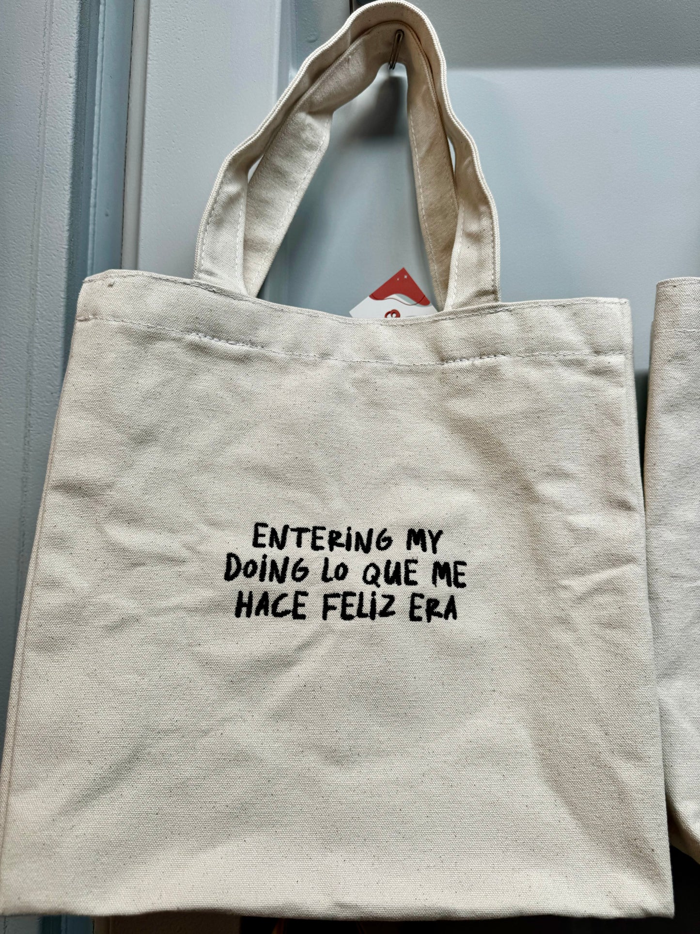 feliz era tote bag