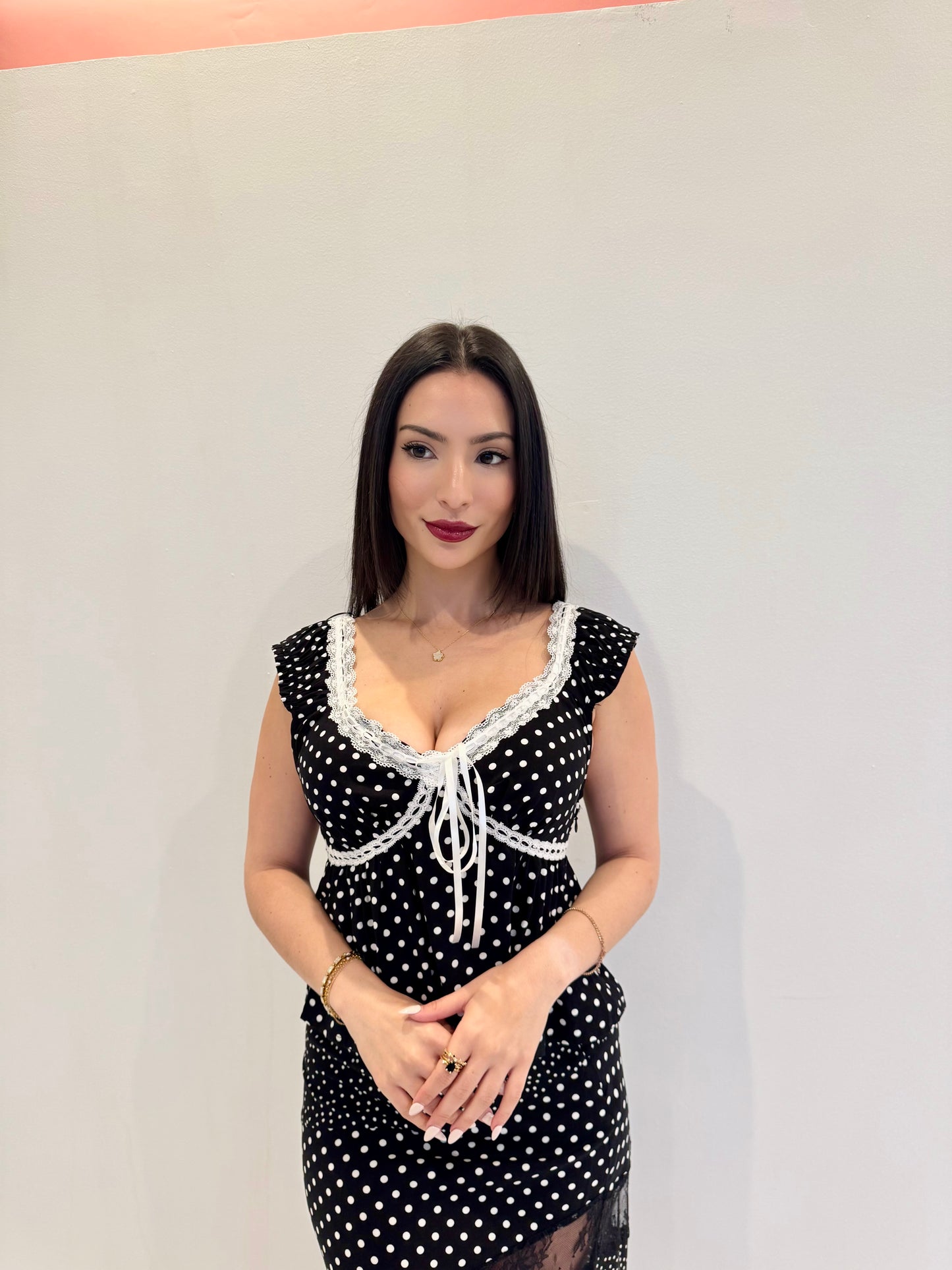 Polka dot black top