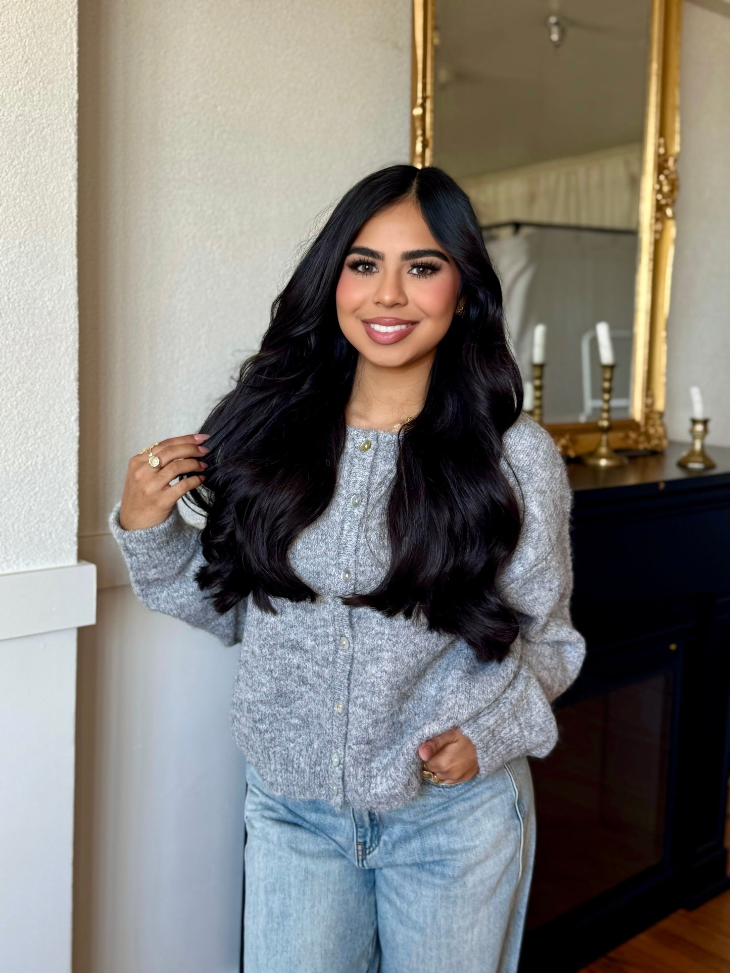 like her gray cardigan