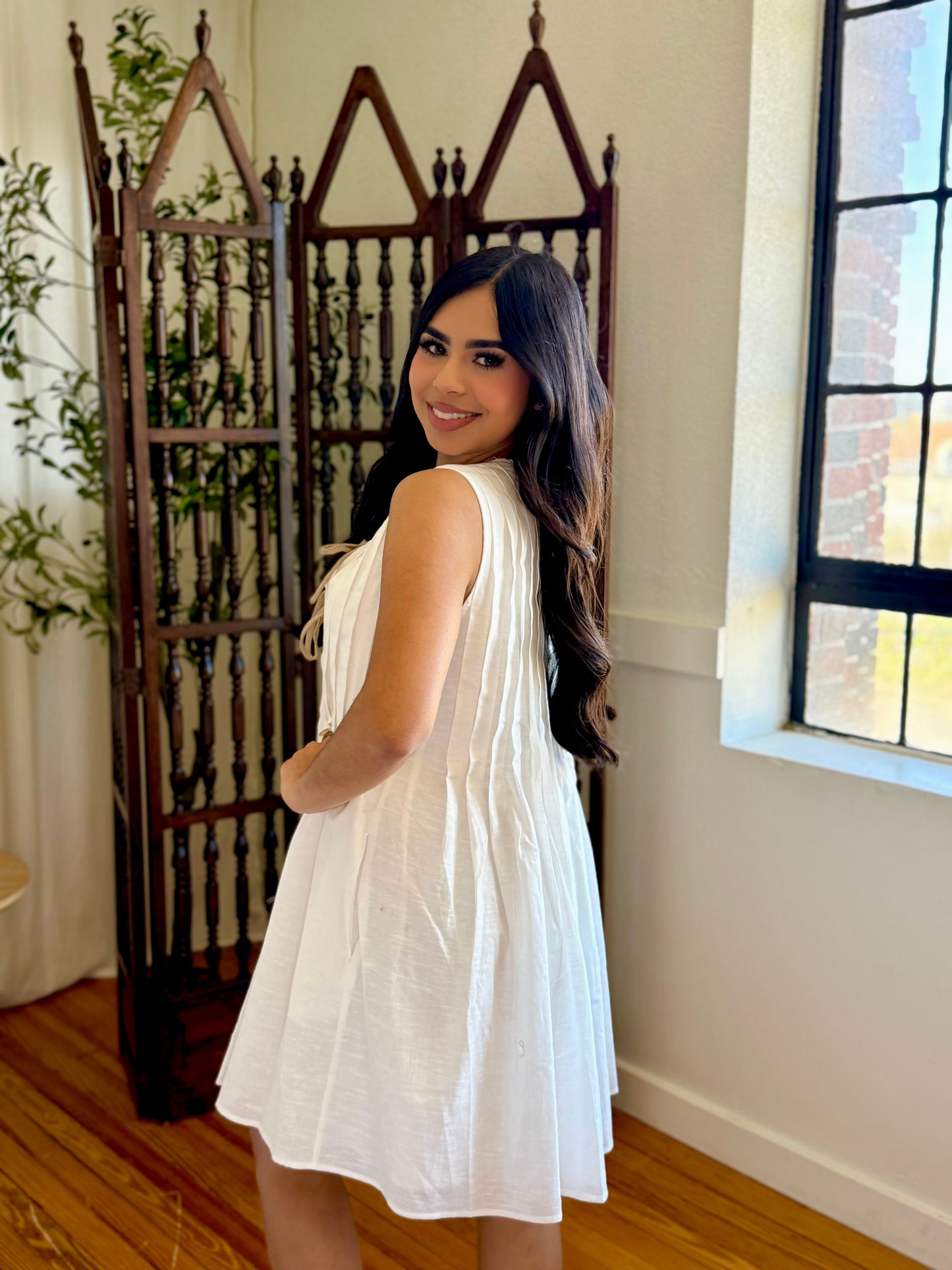 Day taking pleated dress
