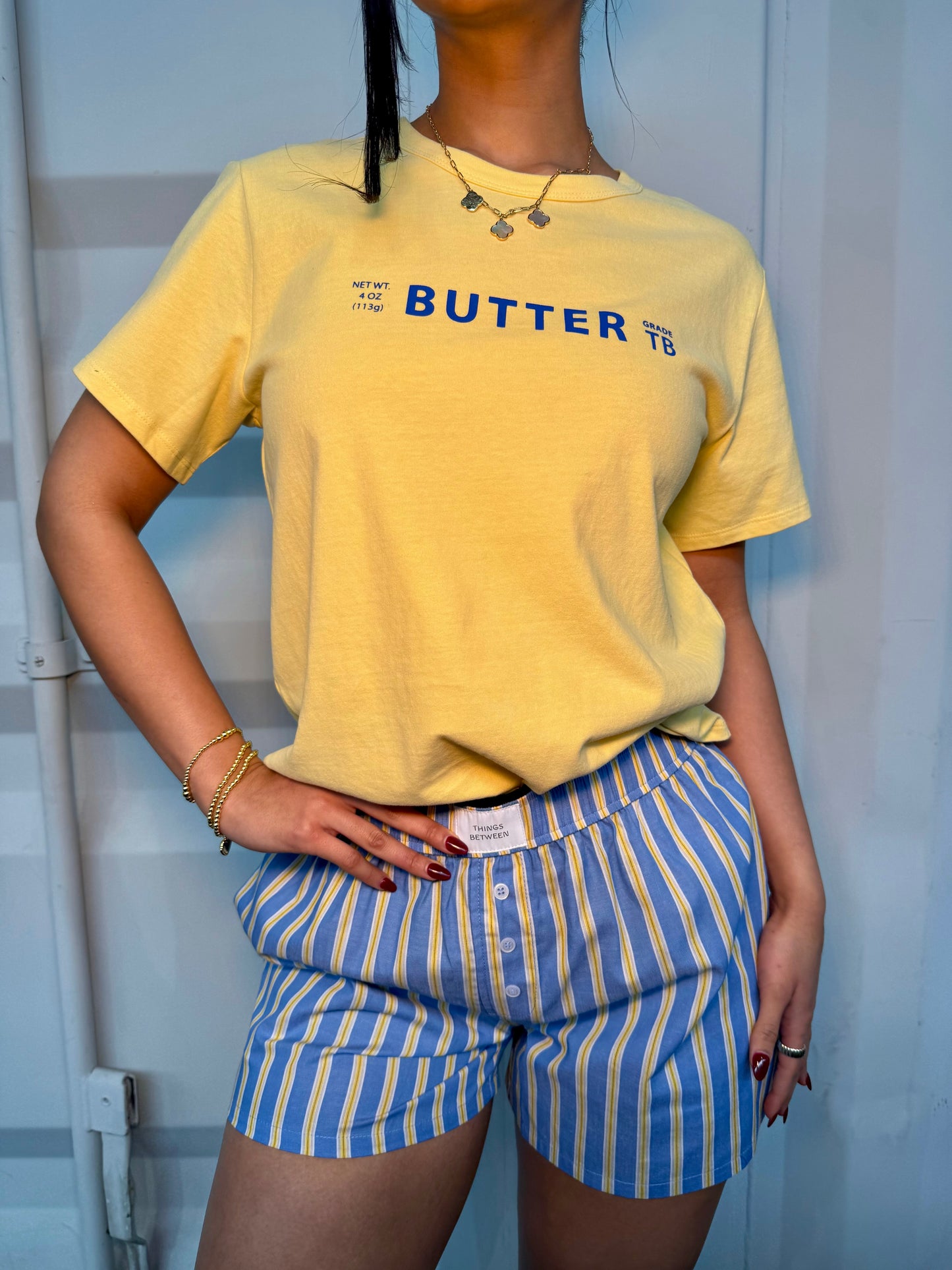 She’s blue boxer shorts